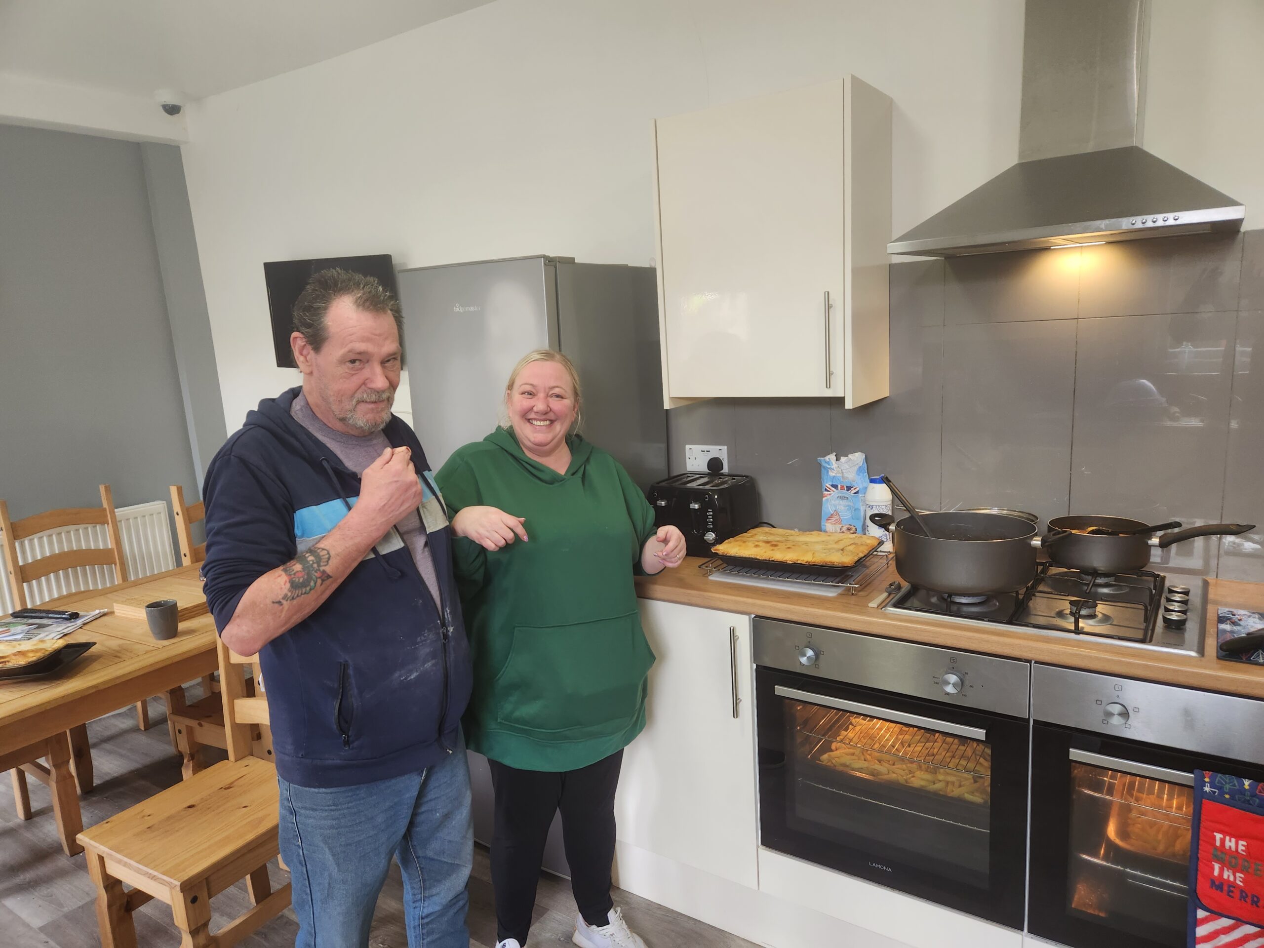 Staff and service user cooking in Ty Ireland, Pen-y-bont ar Ogwr