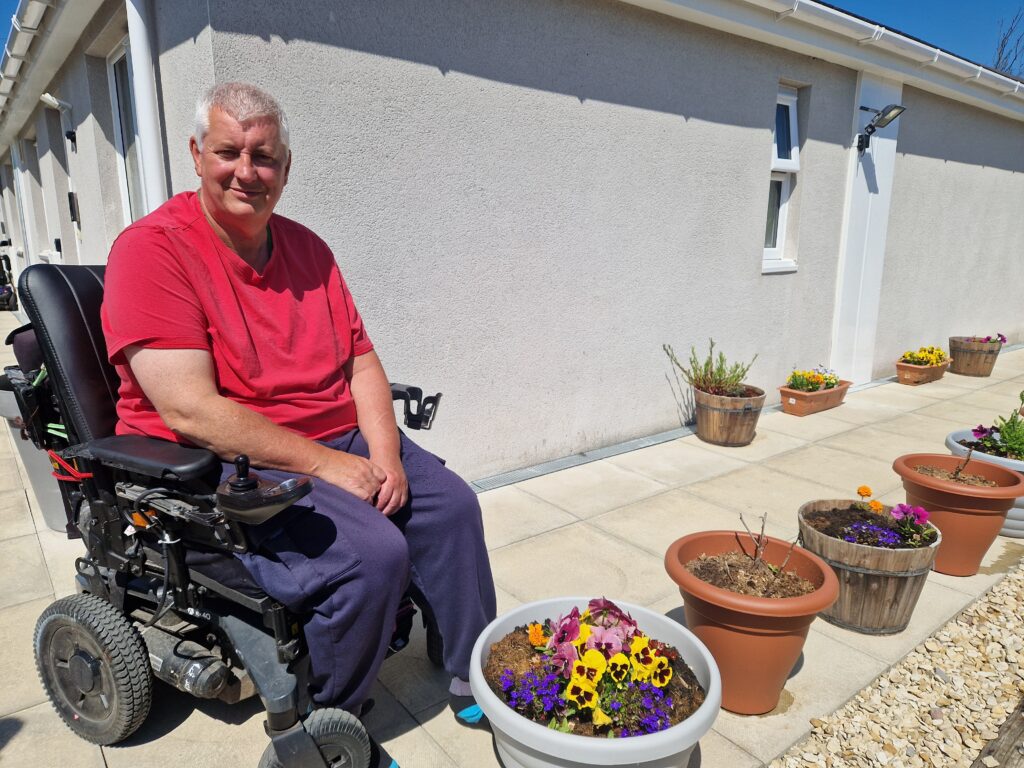 Tom in garden of flat