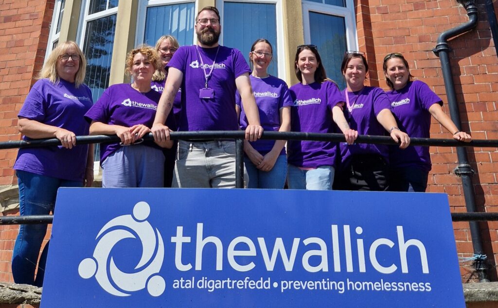 The Wallich ambassadors and team wearing purple t-shirts